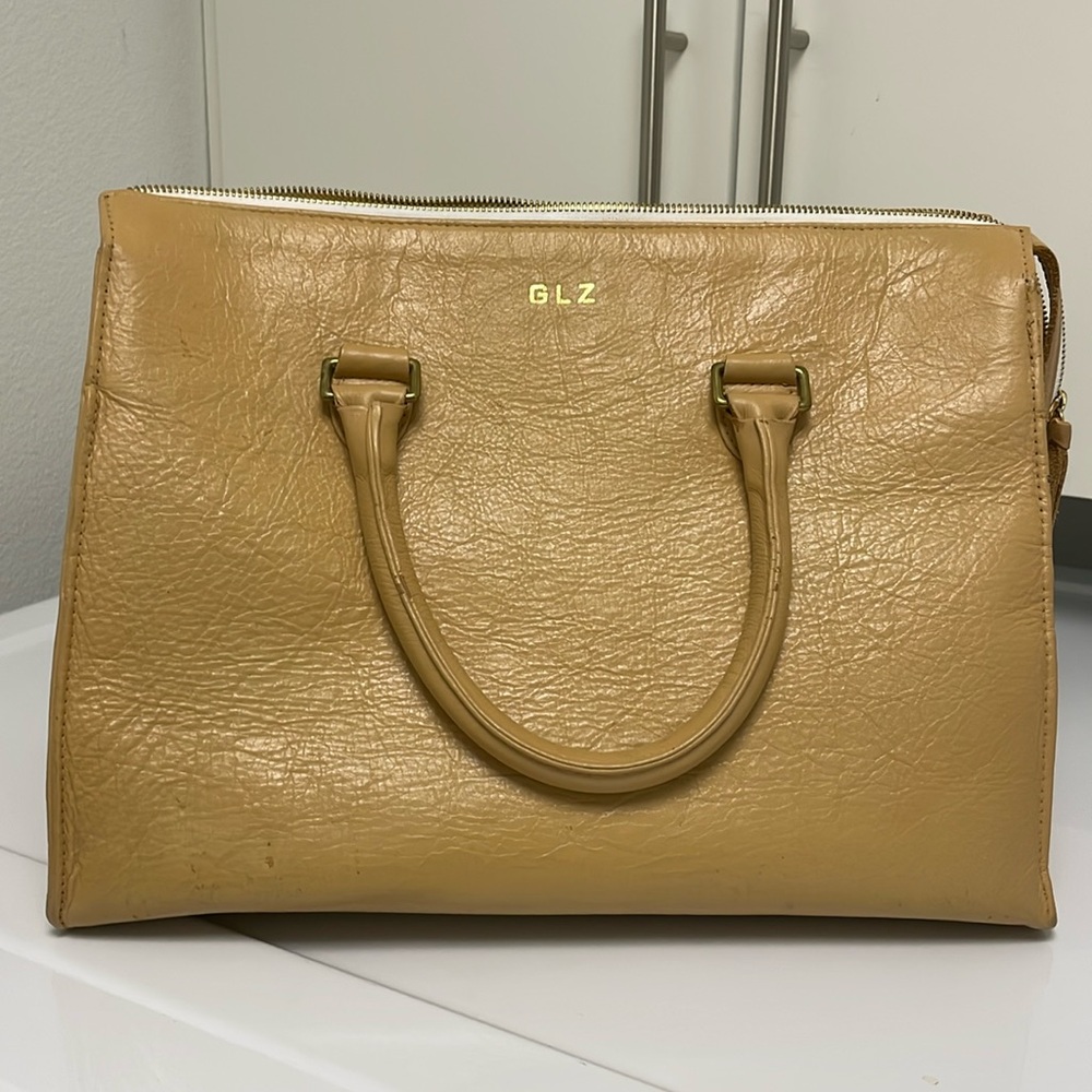 Clare V doctor bag ten inches tall 15 inches wide- leather. Tan. Monogrammed